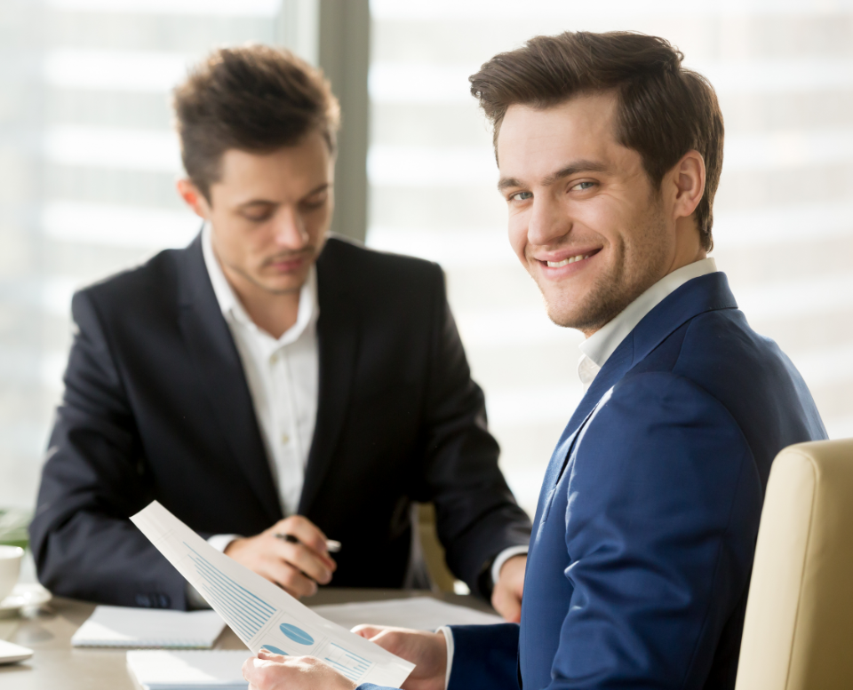 smiling-businessman-financial-analyst-or-stock-broker-looking